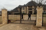 Automatic Driveway Gate w/ Stone Columns & Security Access Code